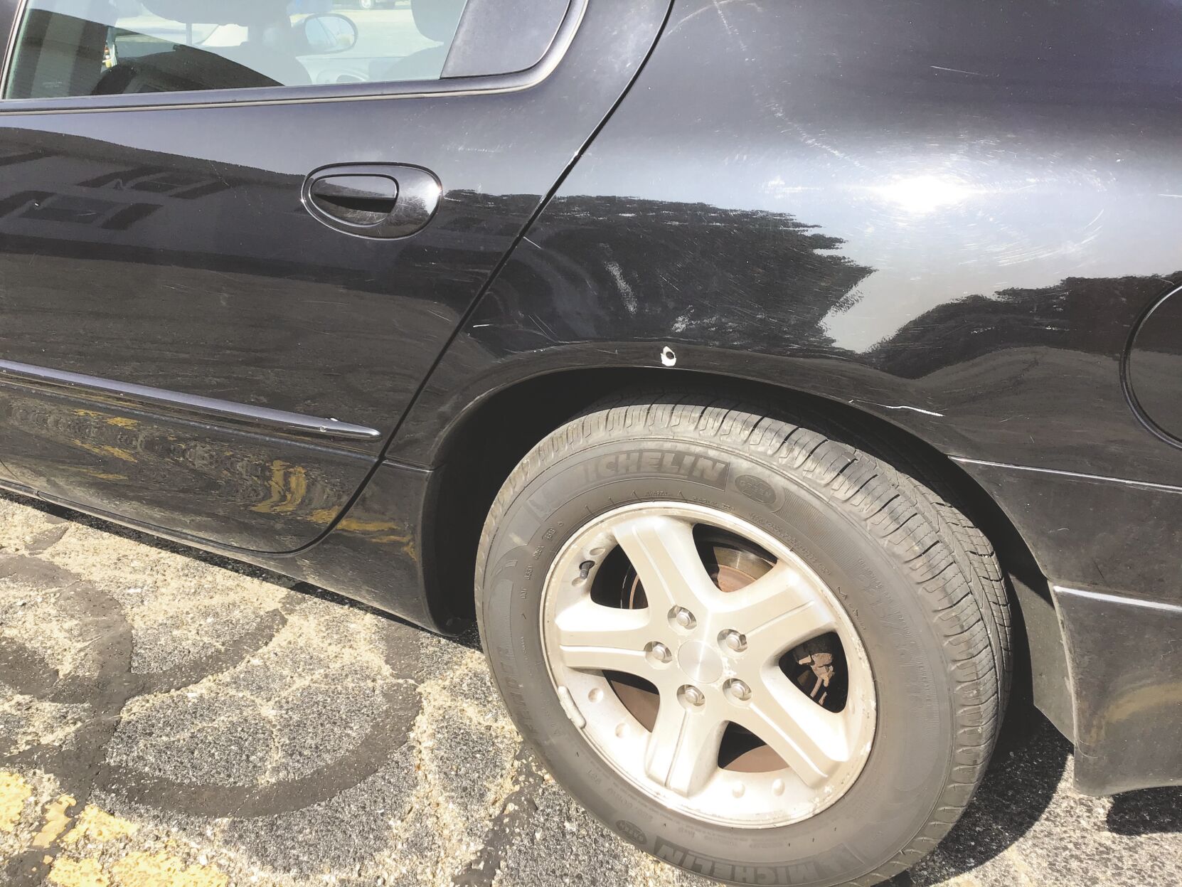 Bullet hole in car